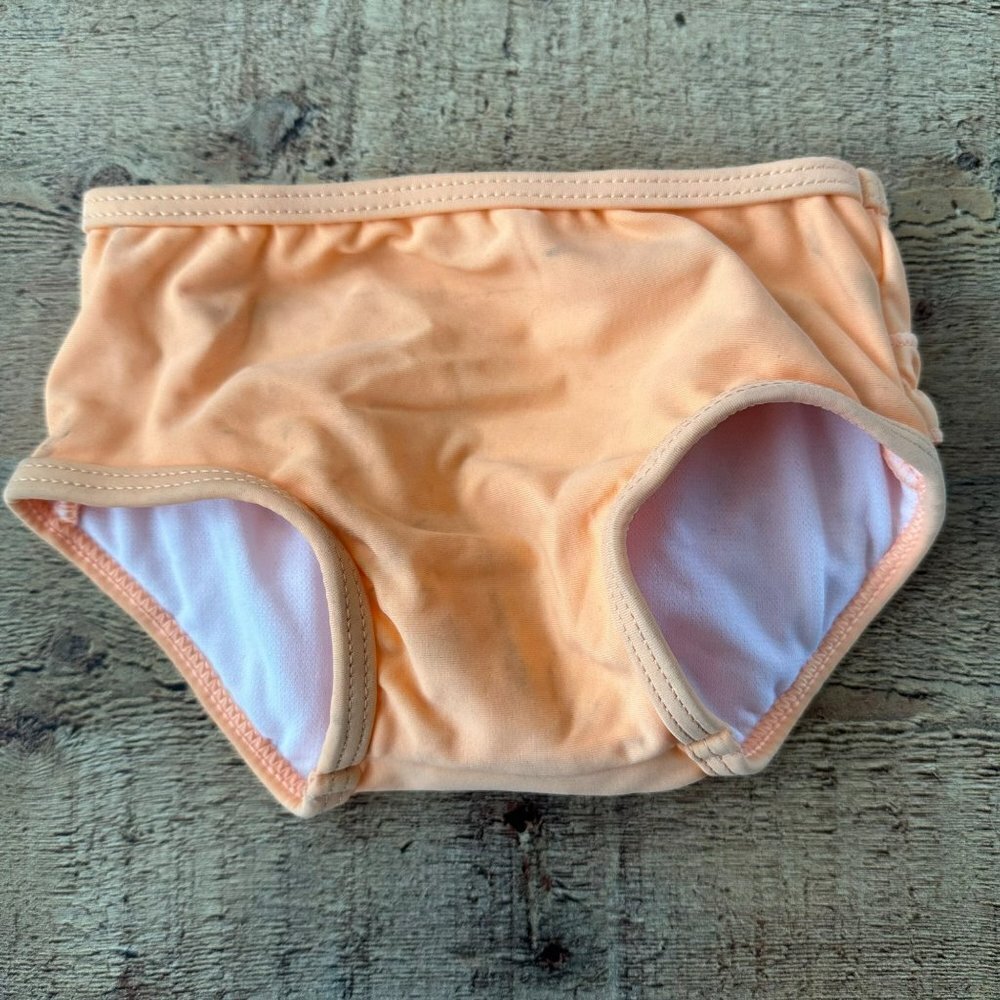 Ruffle Butts Baby Girls Swimsuit Bottom in oragne -3/6M